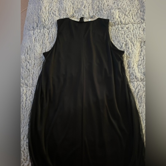 Black flowy dress with pearls and diamonds around the neck. - Picture 3 of 5